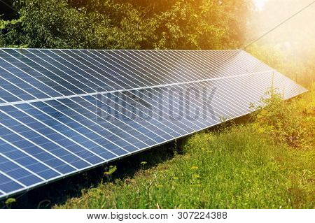 Close-up Surface Of Lit By Sun Modern Saving Efficient Stand -alone Blue Shiny Solar Photo Voltaic P