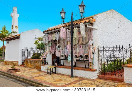 Guatavita,  Colombia June 16 Small Shop Of Wool Clothing Welcomes Visitor In The Old Village Of Guat