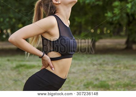 A Young Woman With Beautiful Tits Goes In For Sports In The Park. Makes Lasenko.