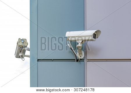 Two Video Surveillance Camera At The End Of The Building