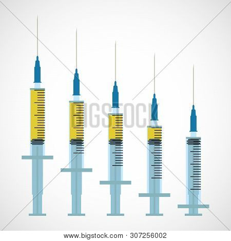 Syringe With Different Doses Of Injection. Medical Instrument. Single-use Sterile Syringe On A White