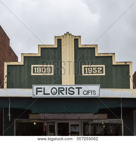 Tenterfield, Australia - April 12, 2019: Beautiful Facade Of A 1904-1952 Art Deco Building With Rend