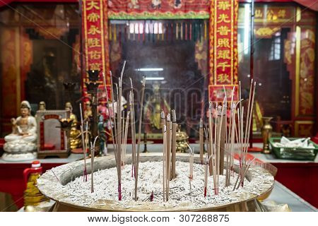 Kuala Lumpur, Malaysia. January 2019.  The Incense Sticks Burning At The Altar In Sin Sze Si Ya Temp
