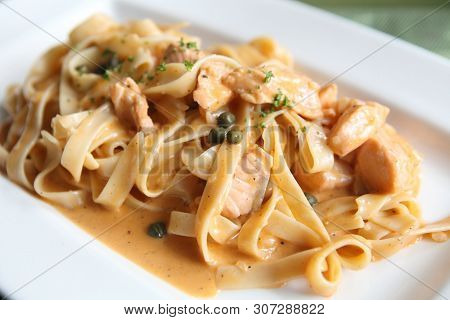 Spaghetti Fettucini Salmon Cream Sauce In Closeup