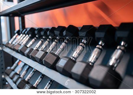 Close Up Of Big Amount Of Barbells Lying In Fitness Gym