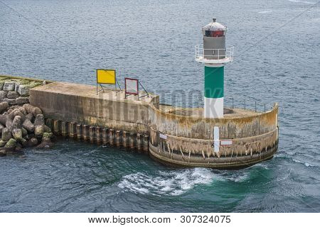Covehead Lighthouse In The Harbour At Rainy Day