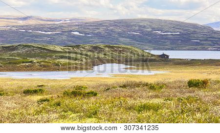 Lake Orkel Located In The Oppdal Area, Norway
