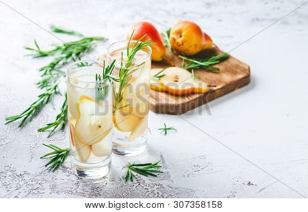 Summer Drinks, Rosemary Pear Cocktails With Ice In Glasses. Refreshing Summer Homemade Alcoholic Or 