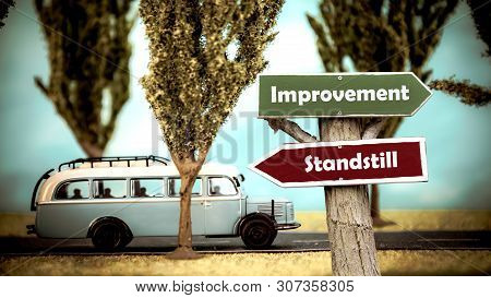 Street Sign The Direction Way To Improvement Versus Standstill
