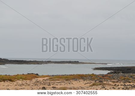 Wonderful Bay Full Of Volcanic Stones In Bajo Ballena. July 8, 2013. El Cotillo La Oliva Fuerteventu
