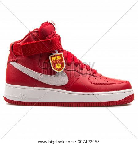 Vienna, Austria - August 25, 2017: Nike Air Force 1 High Retro Qs Red And White Sneaker On White Bac