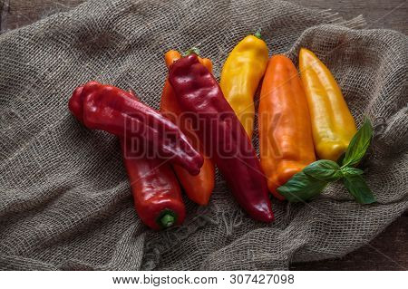 Ripe Ramiro Peppers On Linen Background, Rustic Style