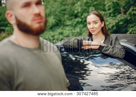 Beautiful Couple Spend Time On A Summer Forest