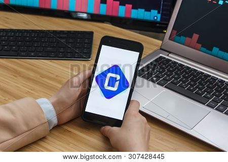 San Francisco, Us - 18 June 2019: Female Trader Hands Holding The Smartphone Using Application Of Co
