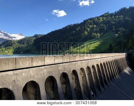 The Dam On The Artificial Alpine Lake Wagitalersee (waegitalersee), Innerthal - Canton Of Schwyz, Sw