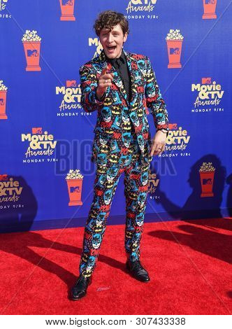 LOS ANGELES - JUN 15:  Brett Dier arrives for the MTV Movie & TV Awards 2019 on June 15, 2019 in Santa Monica, CA