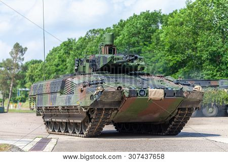 German Infantry Fighting Vehicle Drives On A Street