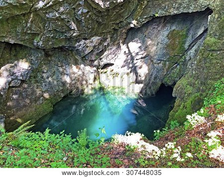 The Cave And The Source Hundsloch By The Alpine Lake Wagitalersee Or Waegitalersee, Innerthal - Cant