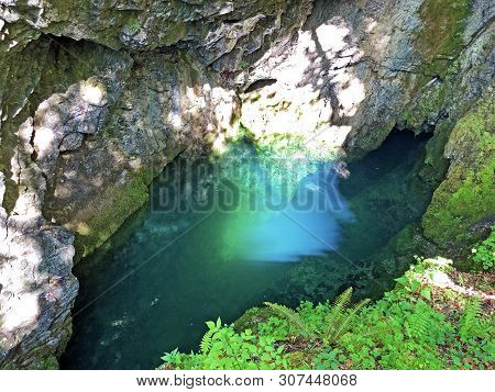 The Cave And The Source Hundsloch By The Alpine Lake Wagitalersee Or Waegitalersee, Innerthal - Cant
