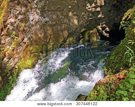 The Cave And The Source Hundsloch By The Alpine Lake Wagitalersee Or Waegitalersee, Innerthal - Cant