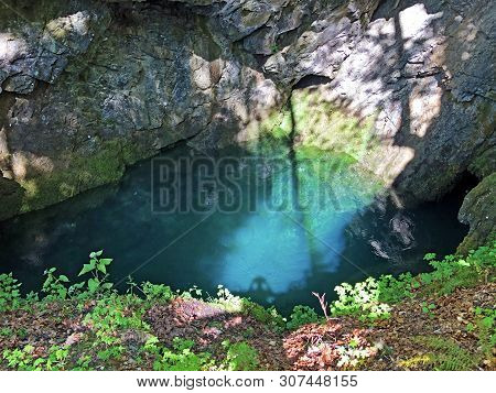 The Cave And The Source Hundsloch By The Alpine Lake Wagitalersee Or Waegitalersee, Innerthal - Cant