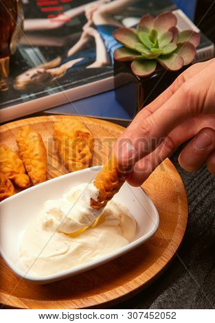 Dipping Traditional Caucasian Dushbere, Gurze Served With Yogurt On Wooden Plate To Yogurt Sauce. Im