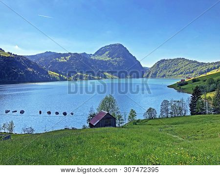 Traditional Architecture And Farmhouse In The Valley Of Wagital Or Waegital And By The Alpine Lake W