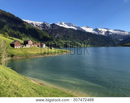 Traditional Architecture And Farmhouse In The Valley Of Wagital Or Waegital And By The Alpine Lake W