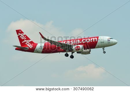 Airplane Landing At Bangkok Airport
