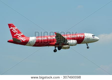 Airplane Landing At Bangkok Airport