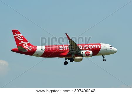 Airplane Landing At Bangkok Airport