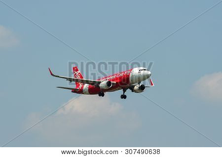 Airplane Landing At Bangkok Airport