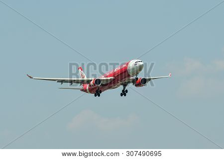 Airplane Landing At Bangkok Airport