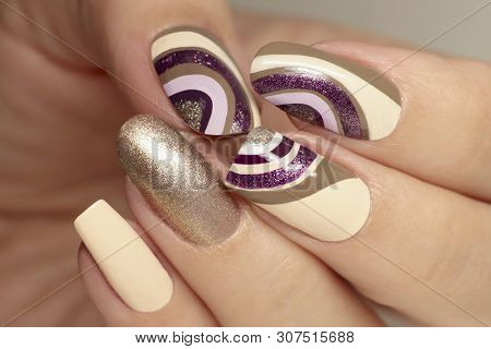 Manicure On A Different Form Of Nails With A Brilliant Varnish On A Background Of A Beige And Violet