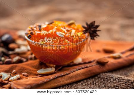 Famous Mango Preservation I.e. Murba Or Murabba In A Glass Bowl On Jute Bag's Surface Along With Dry