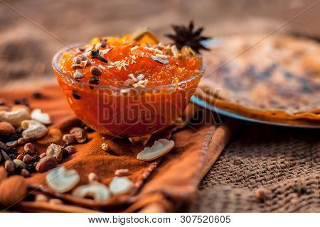Famous Mango Preservation I.e. Murba Or Murabba In A Glass Bowl On Jute Bag's Surface Along With Dry