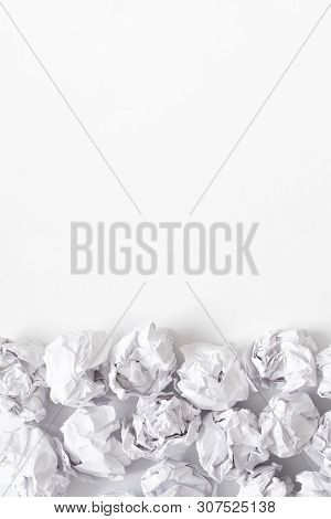 Waste Reduction. Flat Lay Of Crumpled Paper Ball Pile On White Surface. Abstract Background. Copy Sp