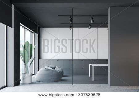 Gray And White Office Waiting Room With Pouffes