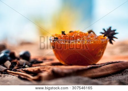 Famous Indian Dessert And Sweet Dish In A Glass Bowl On Jute Bags Surface I.e. Murabba Or Murba Alon