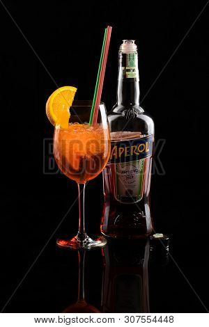 17 May 2019 Bottle And Cocktail Of Italian Drink Aperol Spritz Aperitivo, Over Black Background. Chi