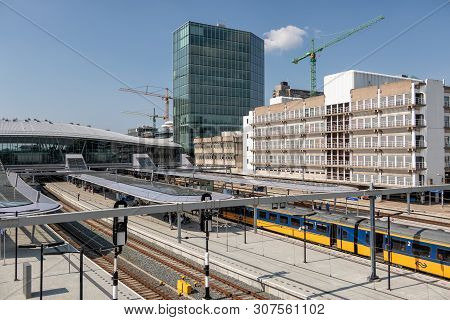 Utrecht, The Netherlands - May 15, 2018: Railway Station Utrecht With Waiting Trains And Travelers