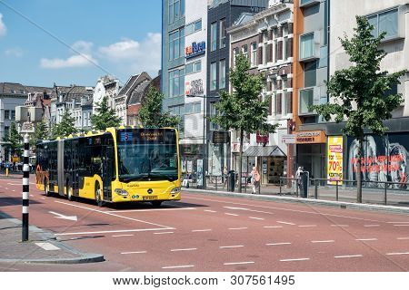 Utrecht, The Netherlands - July 05, 2018: Cityscape Dutch City Utrecht With Urban Bus Waiting For Cr