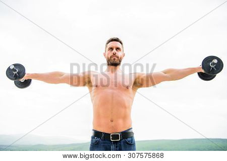 Hustle To Gain More Muscle. Healthy Mind In Healthy Body. Muscular Man Exercising With Dumbbell. Dum