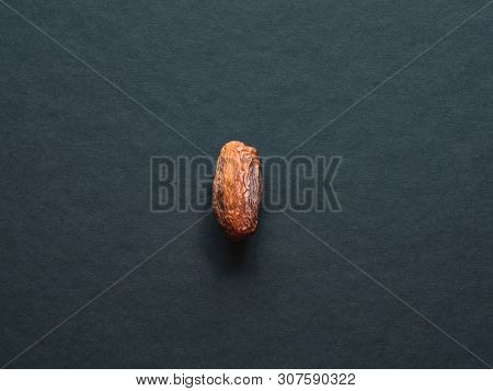 Medjool Al-madina Date Fruit Are Laid Out On A Dark Table. Close Up.