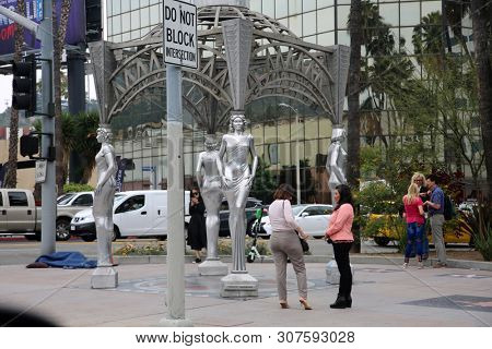 6/18/2019 Hollywood, California: Street Scenes of Hollywood California with street vendors, street performers, homeless, tourist, landmarks and various buildings with signs. Editorial Use Only. 