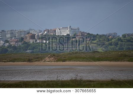 Beautiful Views Of The Buildings Of The Old Town Of Santander City From The Beach In Pedrena. August