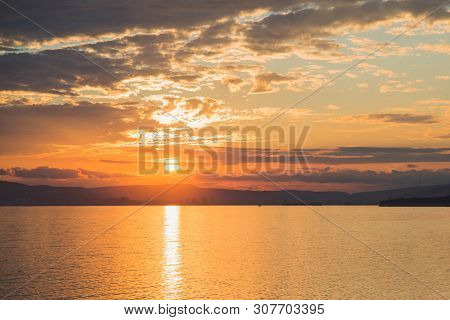View From Sea To Sunset Over Novorossiysk City Of Russia, Black Sea Twilight, Horizontal Panoramic S