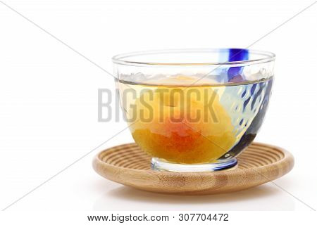 Japanese Plum Wine Called Umeshu On White Background