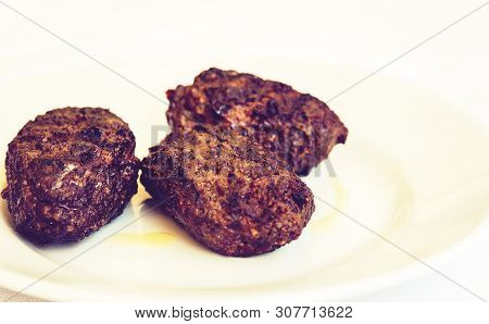 Homemade Fried Minced Meat Balls Horsemeat On White Plate, Traditional Sicilian Dish