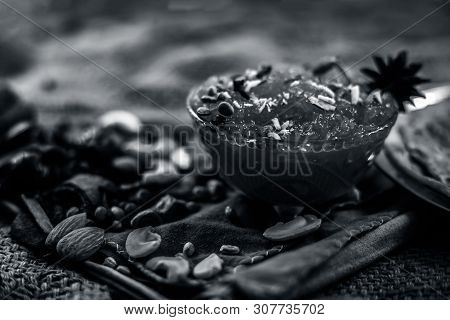 Famous Mango Preservation I.e. Murba Or Murabba In A Glass Bowl On Jute Bags Surface Along With Dry